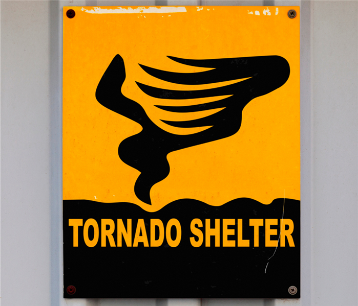 sign that says 'tornado shelter'