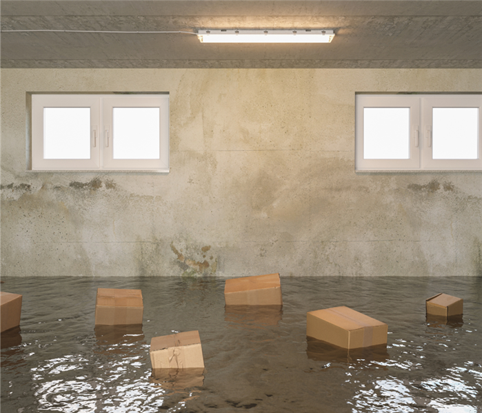 flooded basement with floating boxes